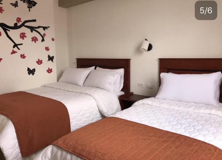 Postel nebo postele na pokoji v ubytování Hotel Seny