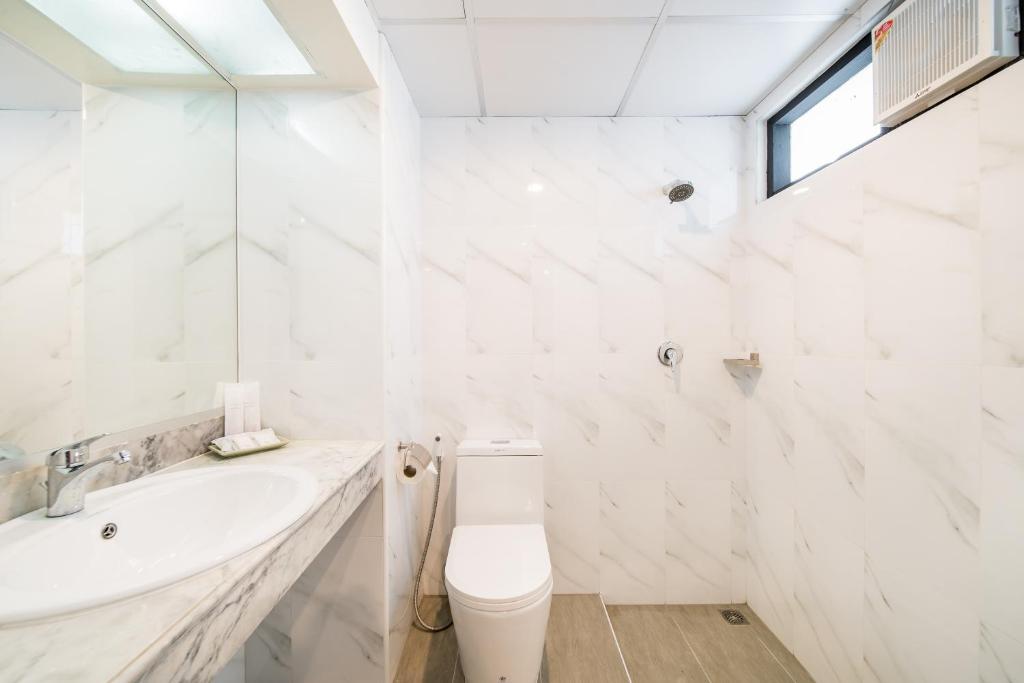 Koupelna v ubytování Niran Grand Hotel