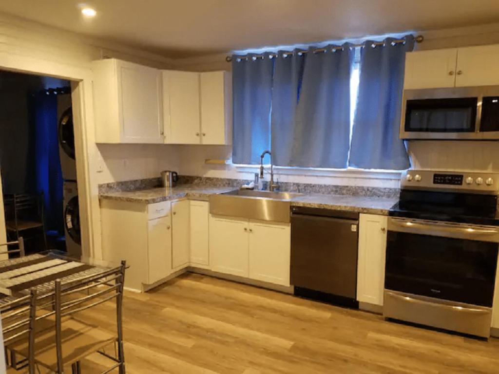 Kuchyň nebo kuchyňský kout v ubytování Unity House