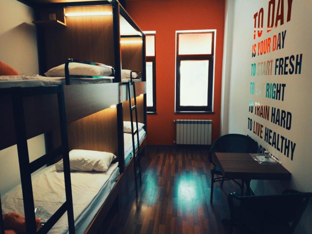 Postel nebo postele na pokoji v ubytování Central Hostel