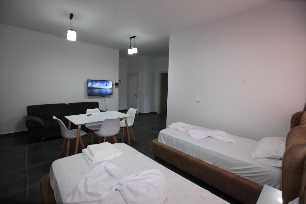 Postel nebo postele na pokoji v ubytování Deda Apartments