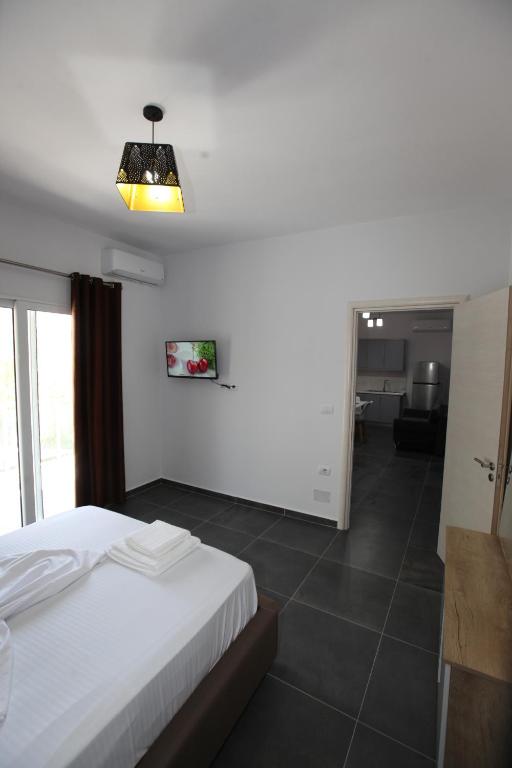 Postel nebo postele na pokoji v ubytování Deda Apartments