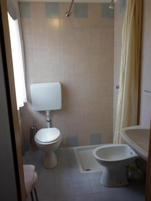 Koupelna v ubytování Hotel Aurora
