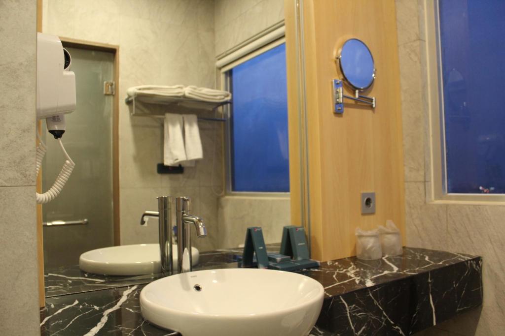 Vannituba majutusasutuses Shakti Hotel Bandung