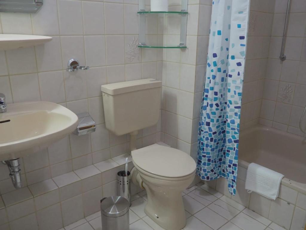 Koupelna v ubytování Hotel Clemens