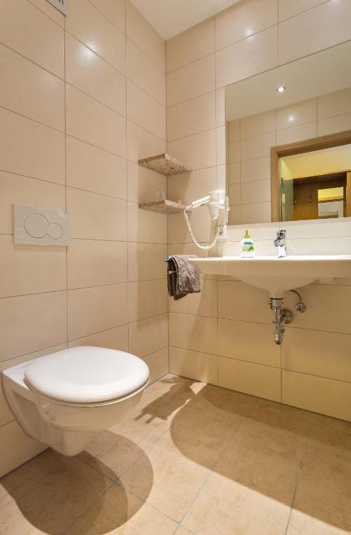 Koupelna v ubytování Hotel Sixt