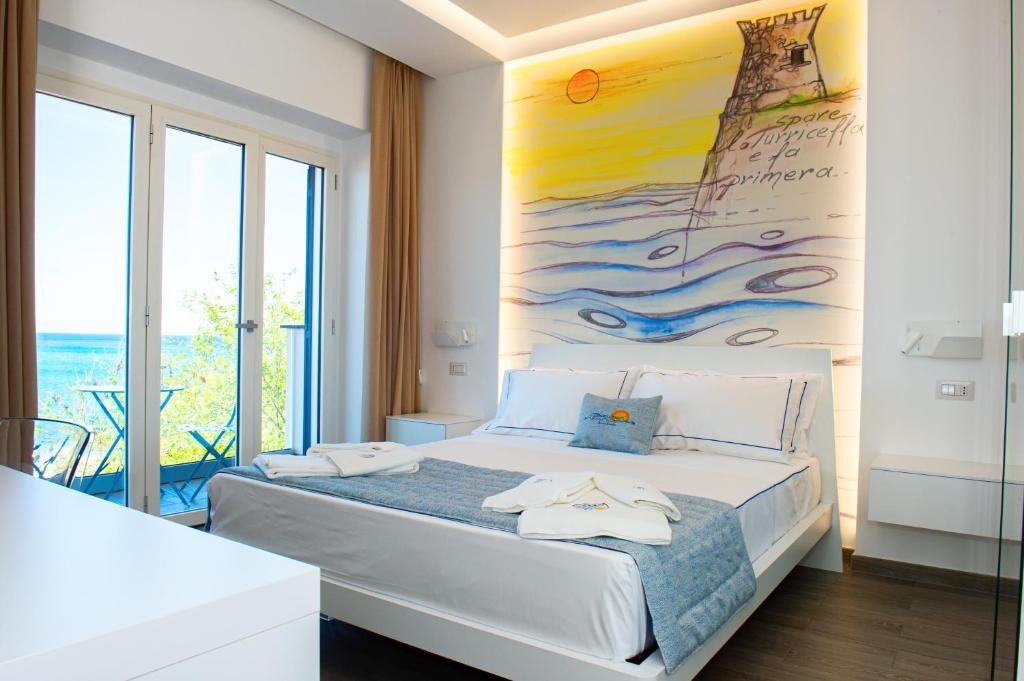 Postel nebo postele na pokoji v ubytování Mbaccimari B&B