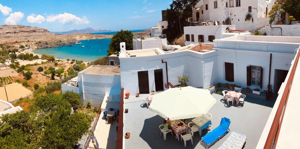 an aerial view of a house with a view of a river at Electra in Lindos