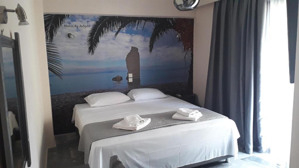 Postel nebo postele na pokoji v ubytování Enalion Beach Hotel