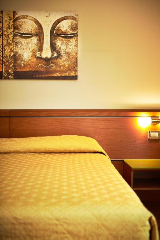 Postel nebo postele na pokoji v ubytování Primhotel
