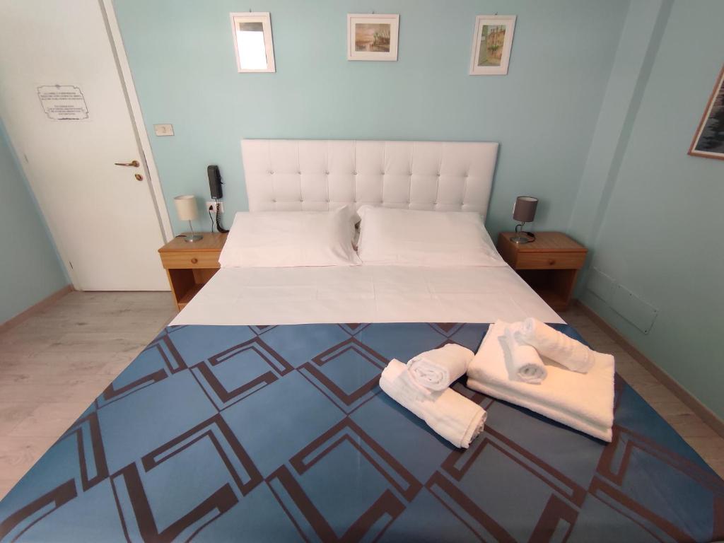 Postel nebo postele na pokoji v ubytování Villa Mirella-NUOVA GESTIONE