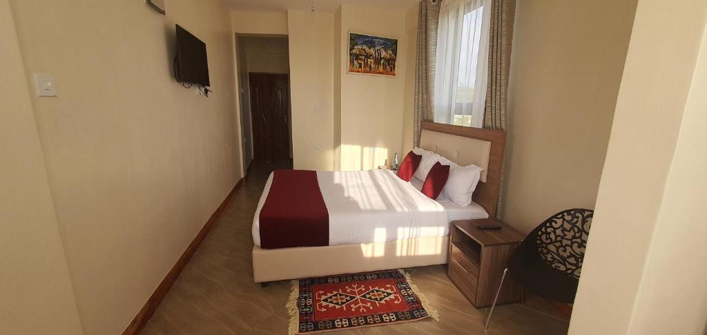 Cama o camas de una habitación en Walabi Mara Hotel