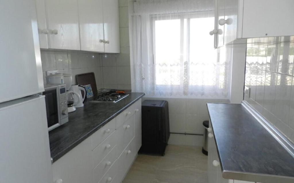 Kuchyň nebo kuchyňský kout v ubytování Apartamento Beata 4 PAX