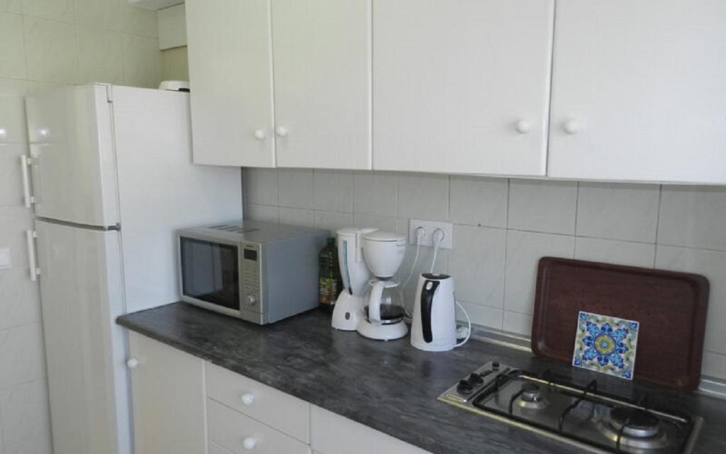 Kuchyň nebo kuchyňský kout v ubytování Apartamento Beata 4 PAX