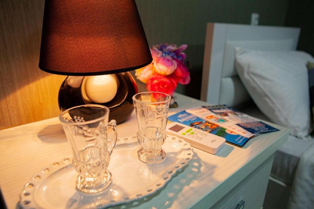 Postel nebo postele na pokoji v ubytování Twins Hotel