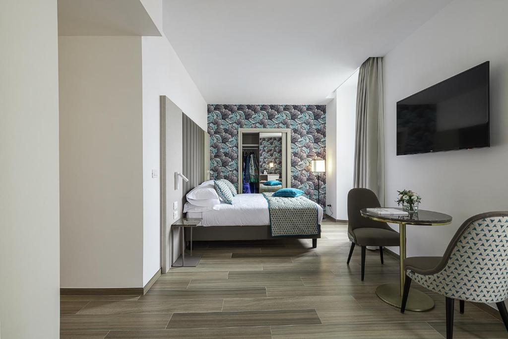 Кровать или кровати в номере Sublimis Boutique Hotel Adults-Only