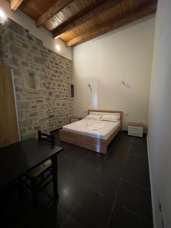 Postel nebo postele na pokoji v ubytování Hotel Guri Shengjin
