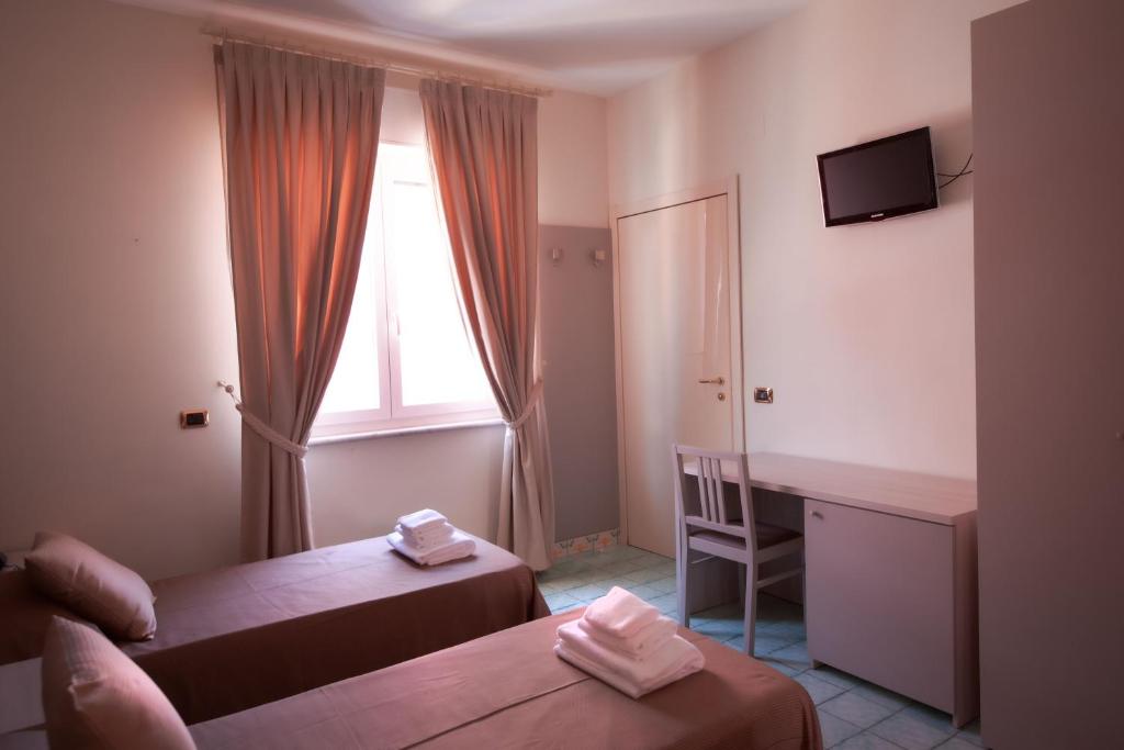 Postel nebo postele na pokoji v ubytování Villa degli Argentieri