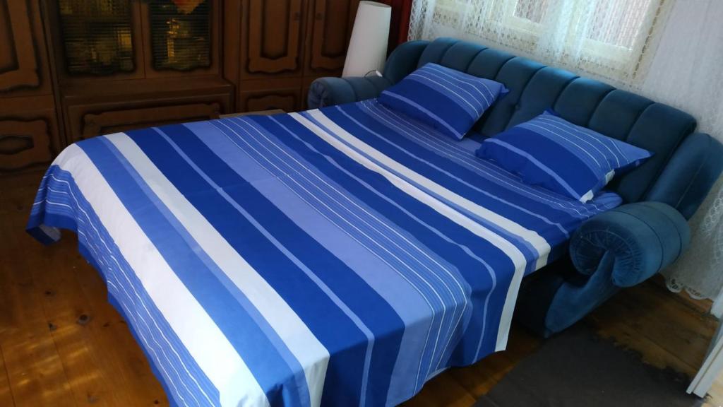 Postel nebo postele na pokoji v ubytování Bistrički mir 1