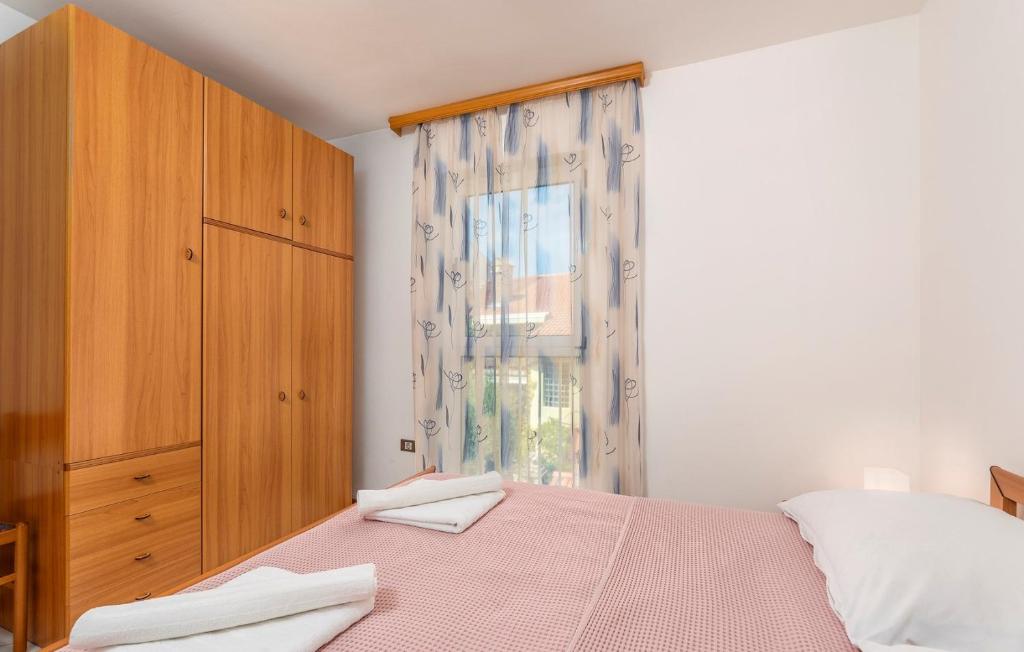 Posteľ alebo postele v izbe v ubytovaní Apartment Batana
