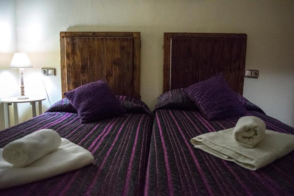 Posteľ alebo postele v izbe v ubytovaní Vivienda Turistica El Caneco