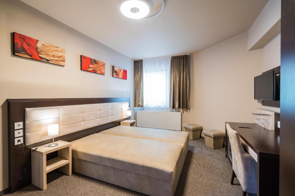 Postel nebo postele na pokoji v ubytování Beach Magánszállás