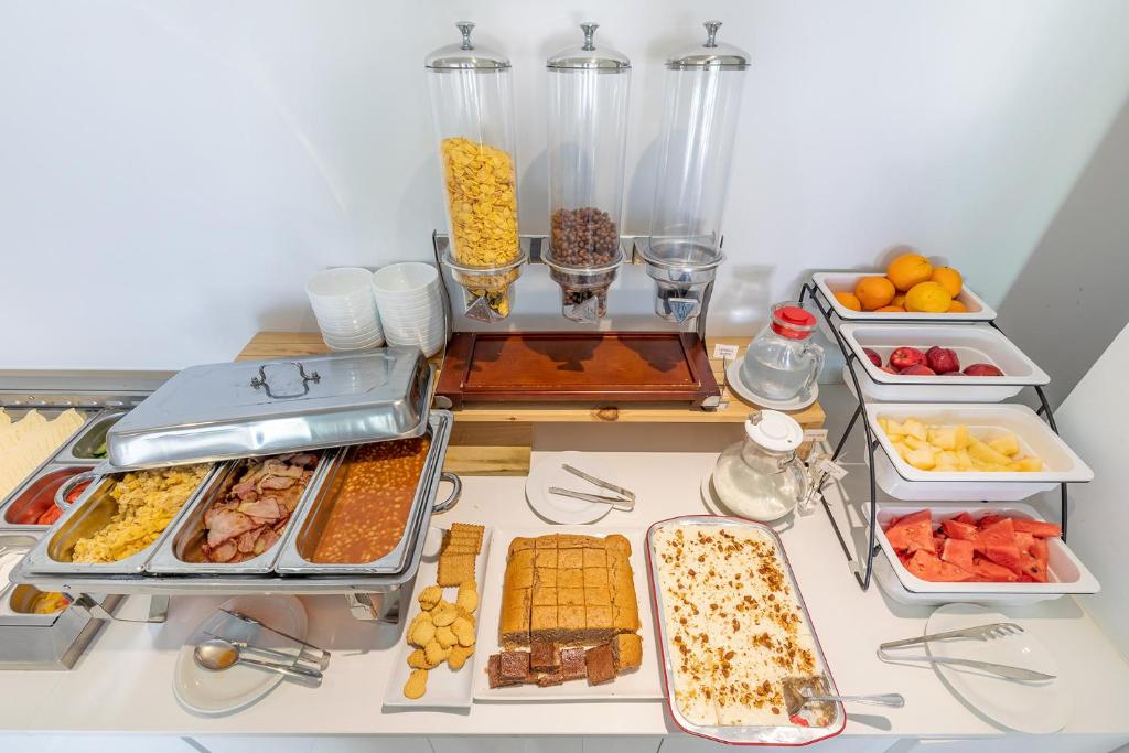 a buffet with many different types of food on a table at Bellini Hotel in Ayia Napa