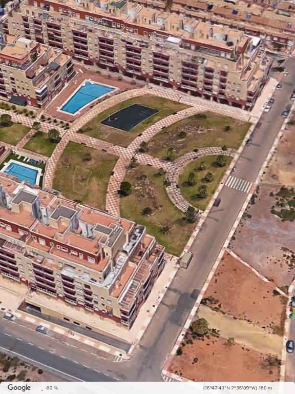 Bazén v ubytovaní APARTAMENTO LAS PALMERILLAS-RESIDENCIAL TORREQUEBRADA alebo v jeho blízkosti