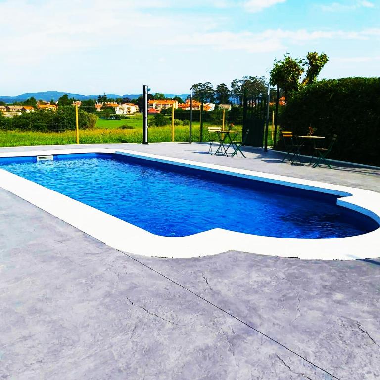 Bazén v ubytování Viviendas Complejo Vacacional PLAYAS DE MUROS nebo v jeho okolí
