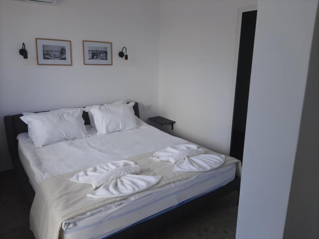 Postel nebo postele na pokoji v ubytování Hotel Mistral