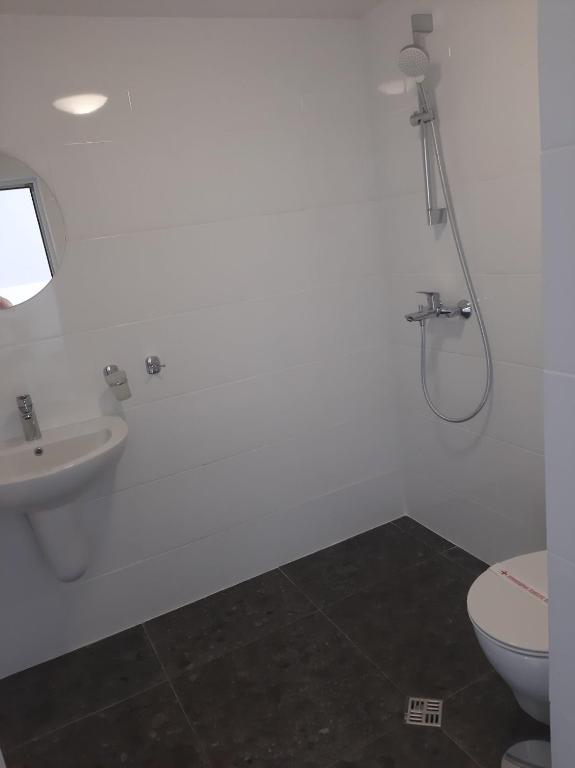 Koupelna v ubytování Hotel Mistral