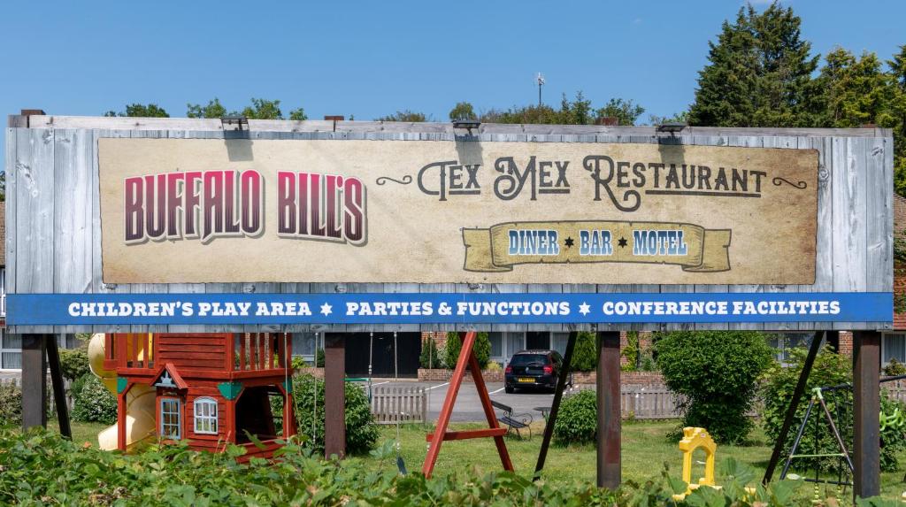 a sign for a building with a house on it at Buffalo Bill's in Halland