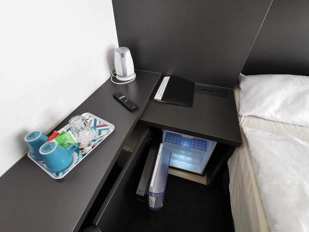 Postel nebo postele na pokoji v ubytování Cha Cha Rooms