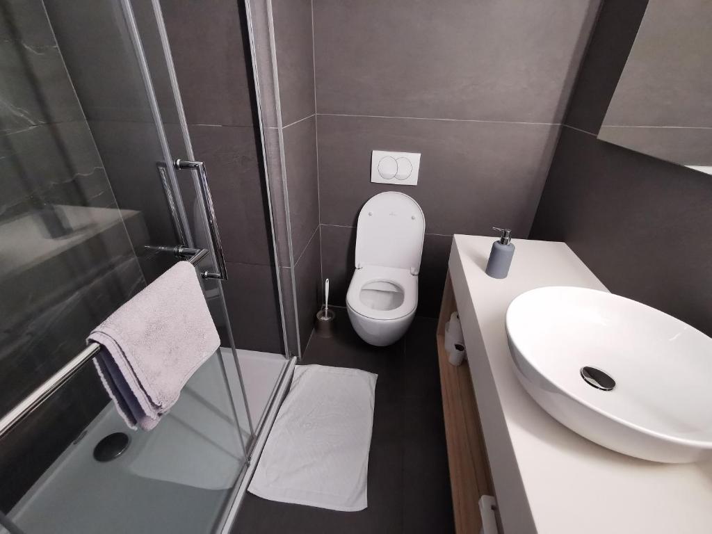 Koupelna v ubytování Cha Cha Rooms