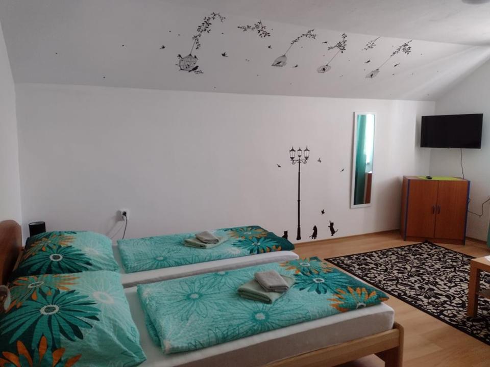 Postel nebo postele na pokoji v ubytování Villa LIKE "garden-grill"