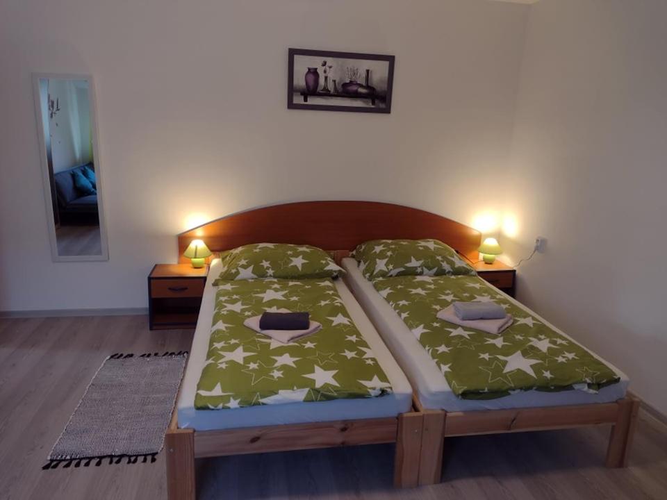 Postel nebo postele na pokoji v ubytování Villa LIKE "garden-grill"