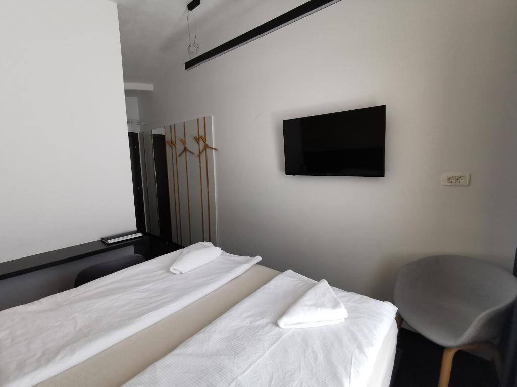 Postel nebo postele na pokoji v ubytování Cha Cha Rooms