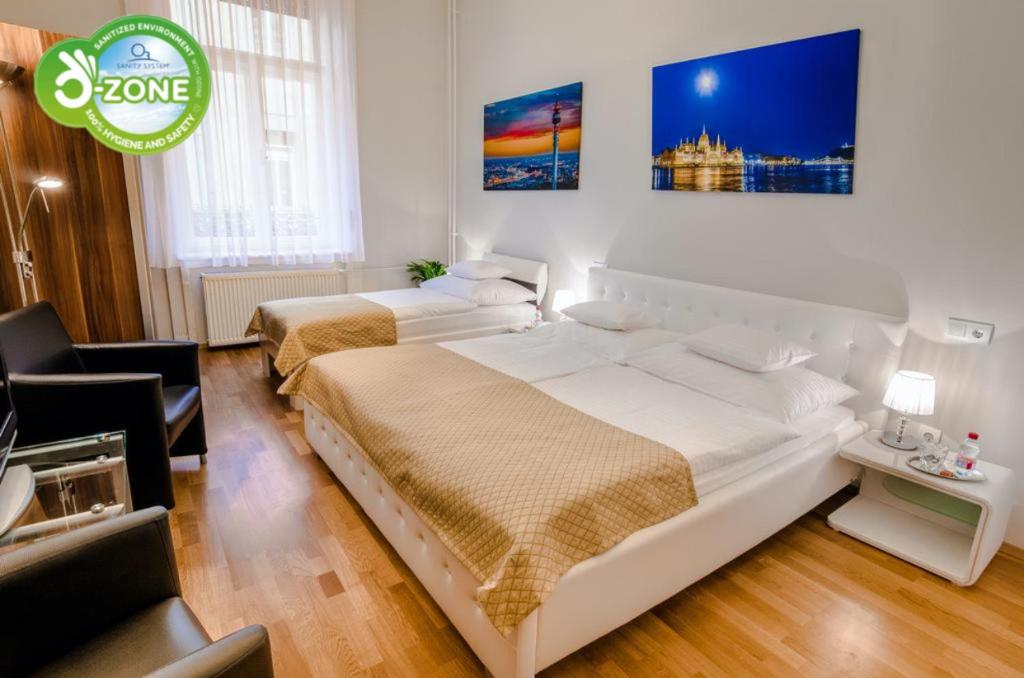 Postel nebo postele na pokoji v ubytování Anabelle Bed and Budapest