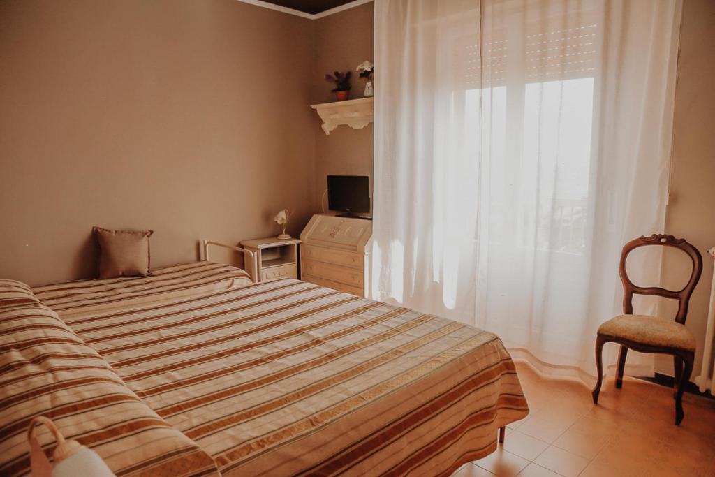 Postel nebo postele na pokoji v ubytování Lampada di Aladino