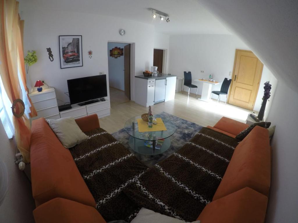 Posezení v ubytování Ferienwohnung Am Sonnenweg