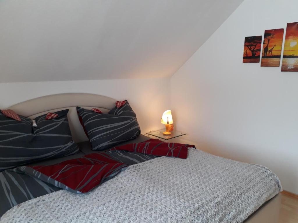 Postel nebo postele na pokoji v ubytování Ferienwohnung Am Sonnenweg