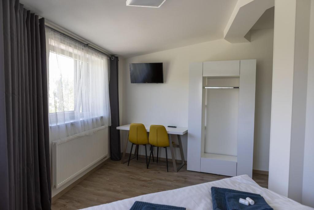 Telewizja i/lub zestaw kina domowego w obiekcie Novohradská