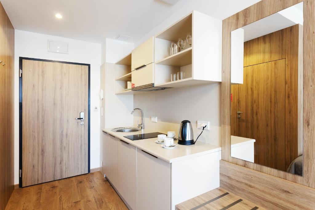 Kuchyňa alebo kuchynka v ubytovaní Wolska Residence I