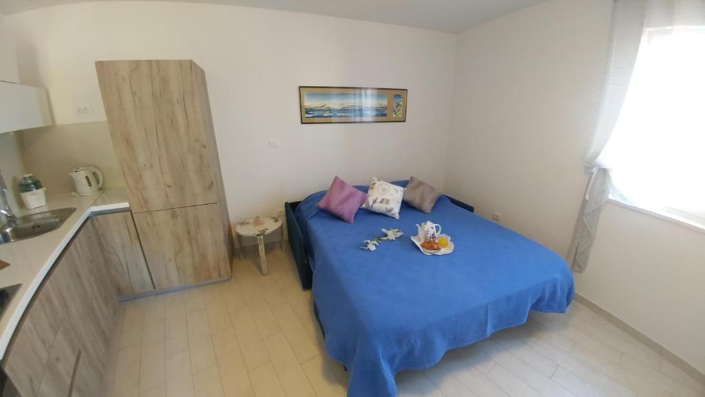 Postel nebo postele na pokoji v ubytování Holiday home Ika