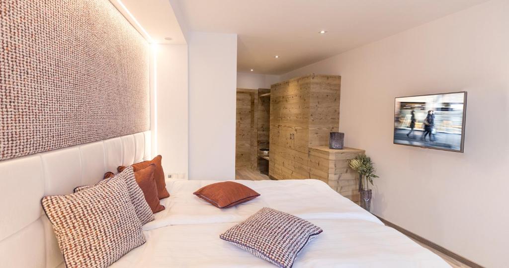 Postel nebo postele na pokoji v ubytování Hotel Flachauerhof