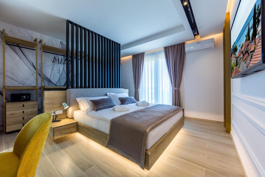 Postel nebo postele na pokoji v ubytování Rocca Riviera Umag Luxury Apartments