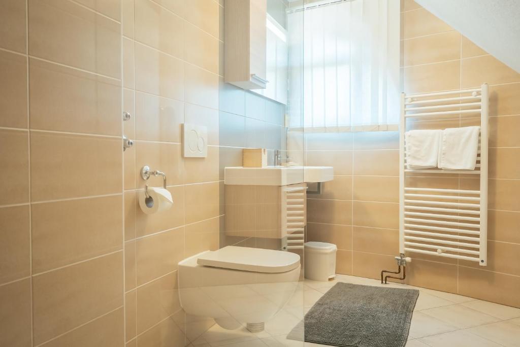 Koupelna v ubytování Garni Hotel Miklič