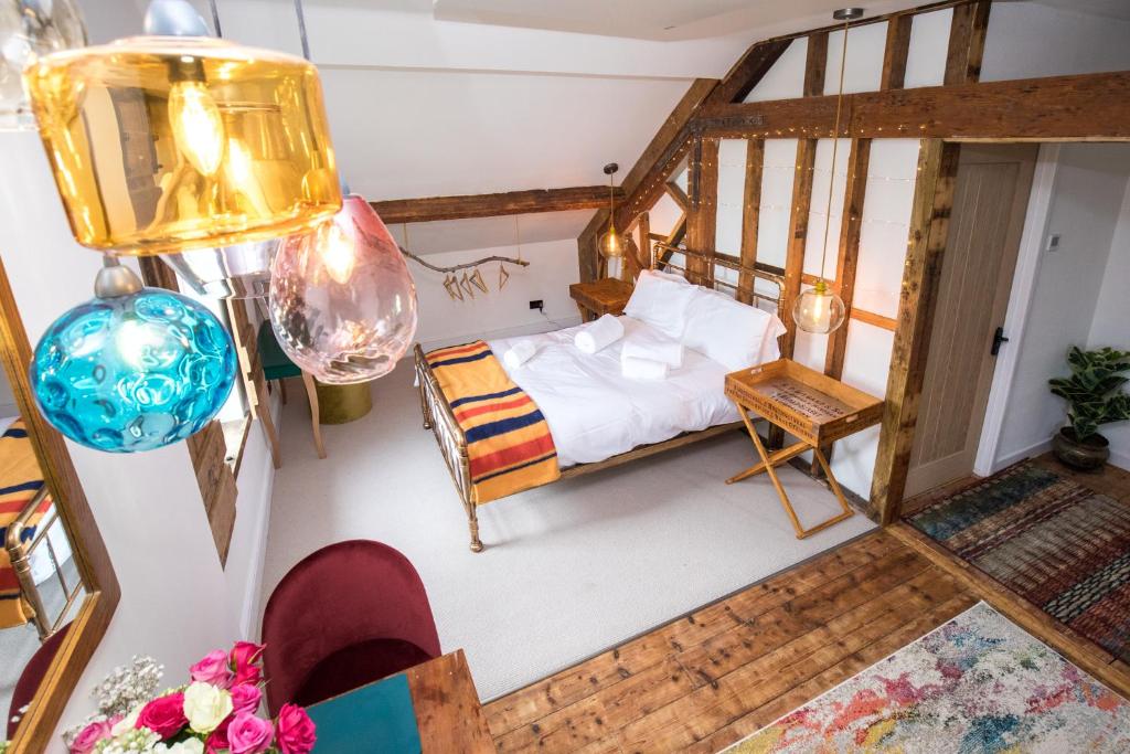 an overhead view of a living room with a couch at James' Place at Brynawel in Merthyr Tydfil