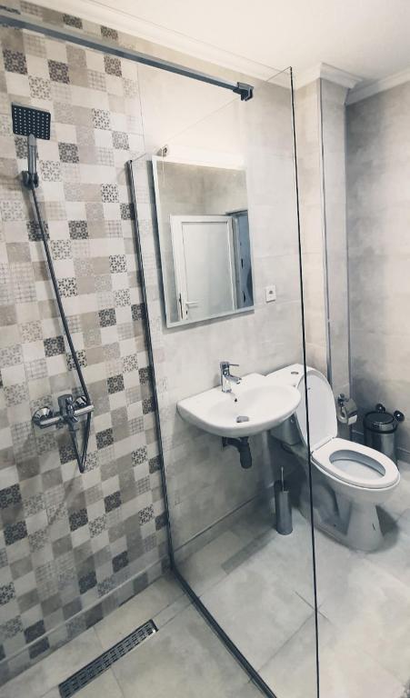 Koupelna v ubytování Apartmani Kaldrma