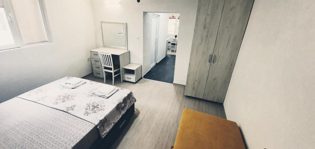 Postel nebo postele na pokoji v ubytování Apartmani Kaldrma